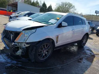2014 Cadillac SRX Performance Collection with VIN 3GYFNCE31ES646075, listed as a IAAI auction lot 41856378 with 172,379 mi miles. Bid and sale history available at carsss.com. Image 14.