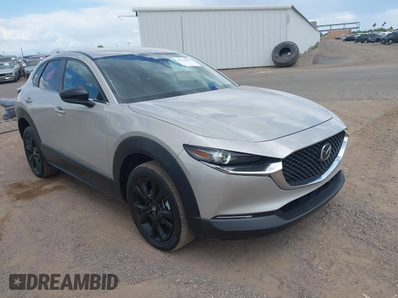 2024 Mazda CX-30 S Select Sport with VIN 3MVDMBBM3RM657918, listed as a IAAI auction lot 42218316 with 27,595 mi miles and . Bid and sale history available at carsss.com. Image 1.