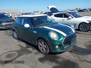 2016 MINI Hardtop z VIN WMWXP5C52G2D13449, wystawiony jako IAAI lot #42337313 z przebiegiem 101 482 mil mil oraz . Historia ofert i sprzedaży dostępna na DreamBid. Obrazek 1.