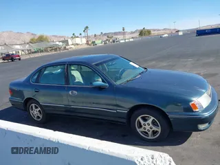 1998 Toyota Avalon XL with VIN 4T1BF18BXWU267131, listed as a IAAI auction lot 41518513 with 208,023 mi miles and . Bid and sale history available at DreamBid. Image 13.