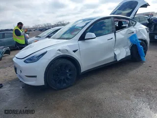 2022 Tesla Model Y Long Range with VIN 7SAYGAEEXNF505144, listed as a IAAI auction lot 41419115 with NaN miles. Bid and sale history available at carsss.com. Image 16.