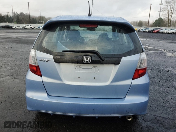 2009 Honda Fit Sport w/Navi with VIN JHMGE886X9S042490, listed as a Copart auction lot 86179244 with 109,130 mi miles and Salvage Title. Bid and sale history available at carsss.com. Image 6.