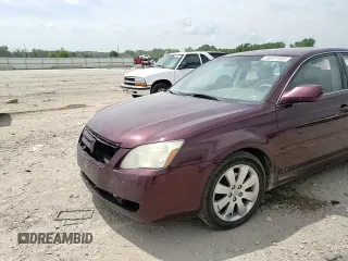 2006 Toyota Avalon XL z VIN 4T1BK36B46U104789, wystawiony jako Copart lot #56001885 z przebiegiem 427 702 mil mil oraz Szkoda całkowita • Salvage title. Historia ofert i sprzedaży dostępna na DreamBid. Obrazek 13.