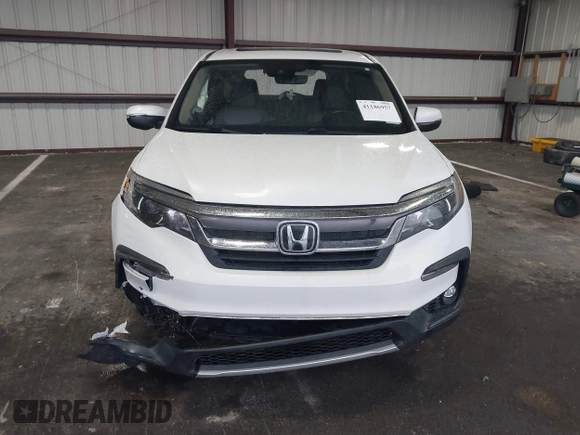 2021 Honda Pilot EX-L with VIN 5FNYF5H57MB022843, listed as a IAAI auction lot 41186957 with 57,836 mi miles. Bid and sale history available at carsss.com. Image 12.