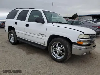 2002 Chevrolet Tahoe LT with VIN 1GNEC13Z32R197071, listed as a Copart auction lot 43734385 with 211,500 mi miles and Salvage Title. Bid and sale history available at carsss.com. Image 4.