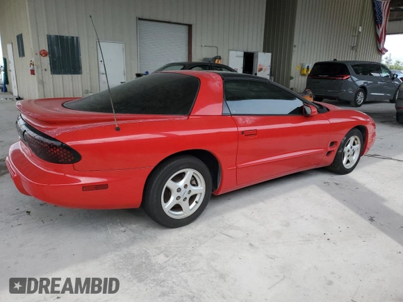2002 Pontiac Firebird Firebird z VIN 2G2FS22KX22112180, wystawiony jako Copart lot #48508295 z przebiegiem Nie podano mil oraz Czysty tytuł • Clean title. Historia ofert i sprzedaży dostępna na DreamBid. Obrazek 3.