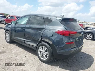 2021 Hyundai Tucson SE with VIN KM8J23A41MU291085, listed as a IAAI auction lot 41956974 with 93,932 mi miles. Bid and sale history available at carsss.com. Image 3.
