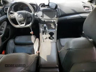 2018 Nissan Maxima SV z VIN 1N4AA6AP2JC379217, wystawiony jako Copart lot #64887215 z przebiegiem 153 063 mil mil oraz Szkoda całkowita • Salvage title. Historia ofert i sprzedaży dostępna na DreamBid. Obrazek 8.