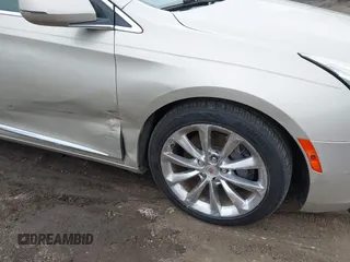 2013 Cadillac XTS Luxury z VIN 2G61R5S30D9174924, wystawiony jako IAAI lot #41958461 z przebiegiem 78 673 mil mil oraz . Historia ofert i sprzedaży dostępna na DreamBid. Obrazek 6.