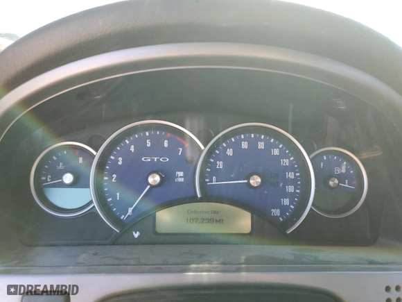 2005 Pontiac GTO with VIN 6G2VX12U25L462371, listed as a Copart auction lot 79575214 with 107,239 mi miles and Salvage Title. Bid and sale history available at carsss.com. Image 9.