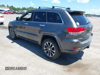 2017 Jeep Grand Cherokee Overland with VIN 1C4RJFCG2HC641791, listed as a IAAI auction lot 42566654 with 116,764 mi miles and . Bid and sale history available at DreamBid. Image 3.