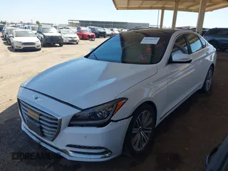 2018 Genesis G80 3.8L with VIN KMHGN4JE3JU216089, listed as a IAAI auction lot 42576639 with 57,382 mi miles and . Bid and sale history available at DreamBid. Image 2.