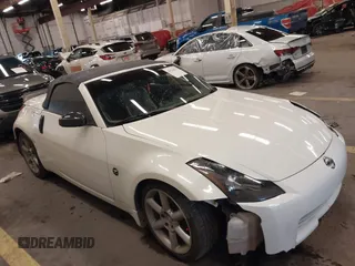 2005 Nissan 350Z Touring with VIN JN1AZ36A45M754923, listed as a IAAI auction lot 41720671 with 124,916 mi miles. Bid and sale history available at carsss.com. Image 13.