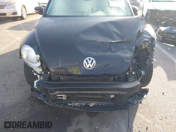 2019 Volkswagen Beetle S with VIN 3VW5DAAT3KM511269, listed as a IAAI auction lot 41473431 with 34,757 mi miles and . Bid and sale history available at DreamBid. Image 6.