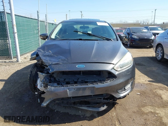 2015 Ford Focus SE with VIN 1FADP3F29FL268677, listed as a IAAI auction lot 42037244 with 118,018 mi miles. Bid and sale history available at carsss.com. Image 13.
