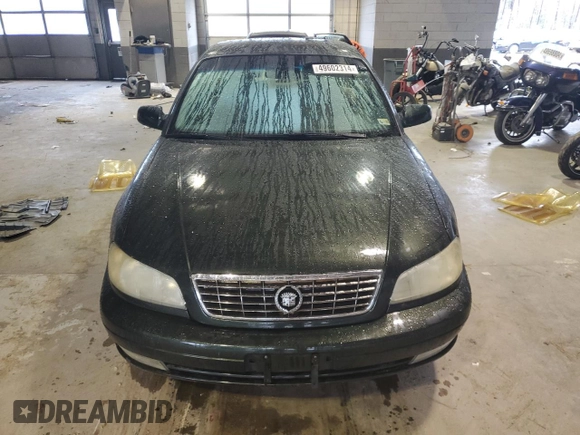 2000 Cadillac Catera z VIN W06VR54R7YR124650, wystawiony jako Copart lot #49602314 z przebiegiem 77 800 mil mil oraz Nie do naprawy • Non repairable. Historia ofert i sprzedaży dostępna na DreamBid. Obrazek 5.