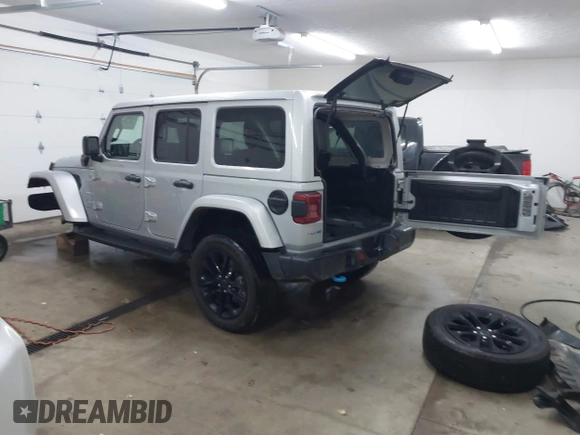 2024 Jeep Wrangler Sahara with VIN 1C4RJXP63RW202929, listed as a IAAI auction lot 41002346 with 12,332 mi miles and . Bid and sale history available at DreamBid. Image 3.