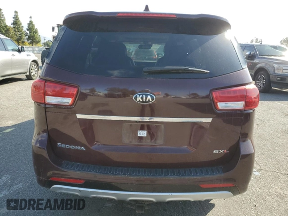 2015 Kia Sedona SX-L with VIN KNDME5C10F6037740, listed as a Copart auction lot 51162595 with 128,111 mi miles and Salvage Title. Bid and sale history available at DreamBid. Image 6.
