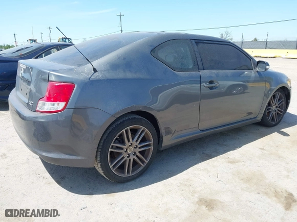 2011 Scion tC with VIN JTKJF5C72B3015652, listed as a IAAI auction lot 42087995 with 175,768 mi miles. Bid and sale history available at carsss.com. Image 4.