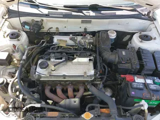 2000 Mitsubishi Mirage DE z VIN JA3AY26C4YU017932, wystawiony jako IAAI lot #42431603 z przebiegiem 193 139 mil mil oraz . Historia ofert i sprzedaży dostępna na DreamBid. Obrazek 10.
