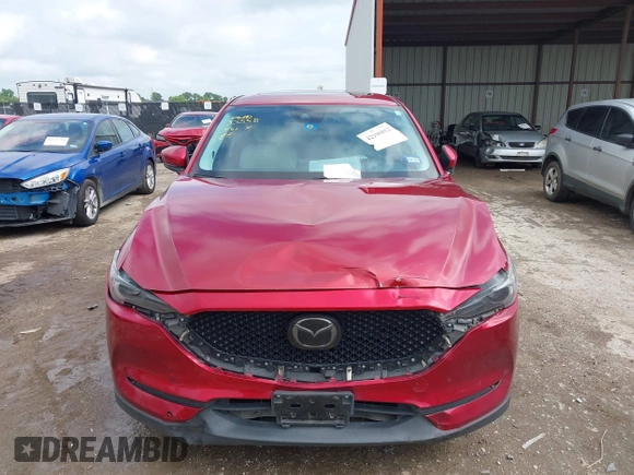 2018 Mazda CX-5 Grand Touring with VIN JM3KFADM7J1357401, listed as a IAAI auction lot 42106012 with 119,420 mi miles and . Bid and sale history available at DreamBid. Image 12.