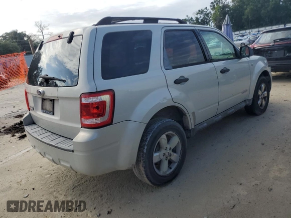 2008 Ford Escape XLT with VIN 1FMCU03108KD50732, listed as a Copart auction lot 62391735 with 224,973 mi miles and Salvage title. Bid and sale history available at DreamBid. Image 3.