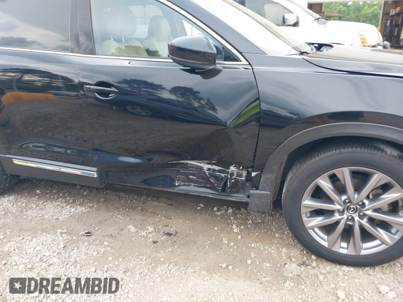 2022 Mazda CX-9 Grand Touring with VIN JM3TCBDYXN0627657, listed as a IAAI auction lot 42498856 with 61,044 mi miles and . Bid and sale history available at DreamBid. Image 6.