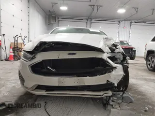 2019 Ford Fusion Hybrid SEL with VIN 3FA6P0MU8KR272811, listed as a IAAI auction lot 41705282 with 56,565 mi miles. Bid and sale history available at carsss.com. Image 12.