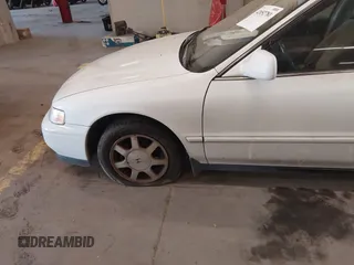 1994 Honda Accord EX with VIN JHMCD5654RC081998, listed as a IAAI auction lot 42052781 with 148,095 mi miles and . Bid and sale history available at carsss.com. Image 6.