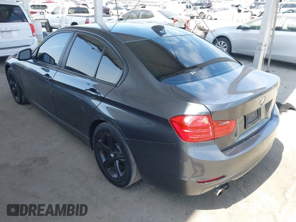 2015 BMW 3 Series 328i with VIN WBA3C1C56FK120073, listed as a IAAI auction lot 42571784 with 162,400 mi miles and . Bid and sale history available at DreamBid. Image 3.