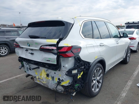 2025 BMW X5 xDrive40i with VIN 5UX23EU06S9W52867, listed as a IAAI auction lot 41726171 with 5,123 mi miles. Bid and sale history available at carsss.com. Image 4.