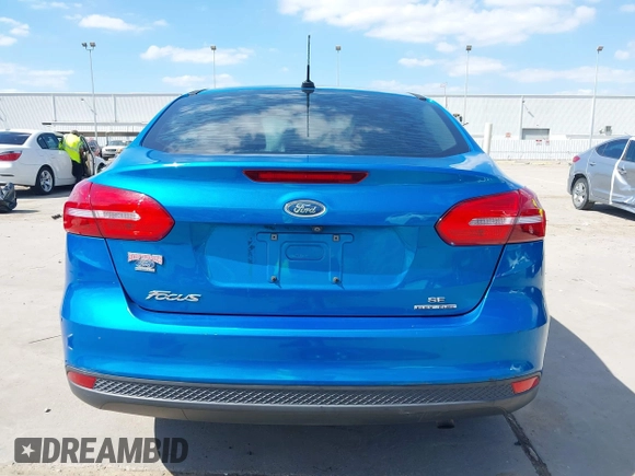 2015 Ford Focus SE with VIN 1FADP3F21FL379837, listed as a IAAI auction lot 42021623 with 146,571 mi miles. Bid and sale history available at carsss.com. Image 16.