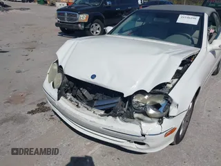 2004 Mercedes-Benz CLK 320 z VIN WDBTK65GX4T018556, wystawiony jako IAAI lot #41546296 z przebiegiem 100 585 mil mil oraz . Historia ofert i sprzedaży dostępna na DreamBid. Obrazek 6.