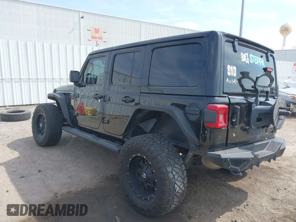2020 Jeep Wrangler Unlimited Sahara with VIN 1C4HJXEG6LW211932, listed as a IAAI auction lot 42040546 with 74,732 mi miles and . Bid and sale history available at DreamBid. Image 3.
