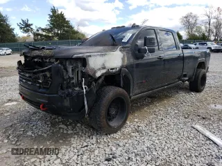 2024 GMC Sierra 3500HD AT4 z VIN 1GT49VEY7RF200824, wystawiony jako Copart lot #49263474 z przebiegiem Nie podano mil oraz Szkody całkowita. Historia ofert i sprzedaży dostępna na DreamBid. Obrazek 1.
