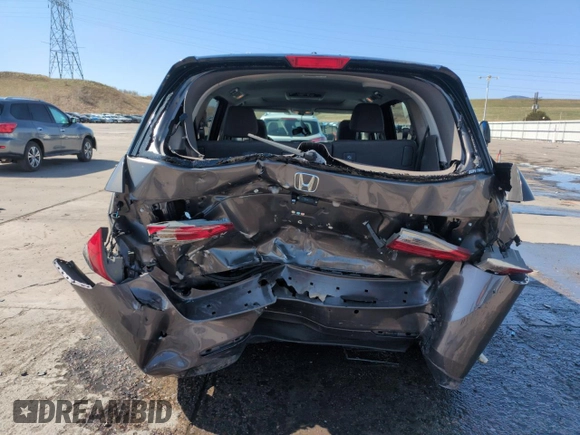 2014 Honda Odyssey Touring with VIN 5FNRL5H95EB052523, listed as a Copart auction lot 52214055 with 131,350 mi miles and Salvage Title. Bid and sale history available at DreamBid. Image 6.