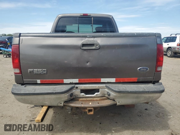 2004 Ford F-250 XL z VIN 1FTNX21P54EB05392, wystawiony jako Copart lot #57982065 z przebiegiem 244 312 mil mil oraz Czysty tytuł • Clean title. Historia ofert i sprzedaży dostępna na DreamBid. Obrazek 6.