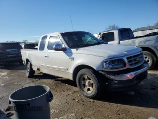 2002 Ford F-150 XL with VIN 1FTRX17L52NA26169, listed as a Copart auction lot 88756715 with 114,841 mi miles and Salvage title. Bid and sale history available at DreamBid. Image 4.