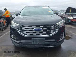 2020 Ford Edge SEL z VIN 2FMPK4J9XLBA78278, wystawiony jako IAAI lot #42181490 z przebiegiem 236 730 mil mil oraz . Historia ofert i sprzedaży dostępna na DreamBid. Obrazek 12.