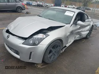 2003 Nissan 350Z Touring z VIN JN1AZ34E43T014247, wystawiony jako IAAI lot #42120812 z przebiegiem 112 263 mil mil oraz . Historia ofert i sprzedaży dostępna na DreamBid. Obrazek 2.
