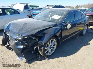 2017 Mazda Mazda6 Touring with VIN JM1GL1V57H1129309, listed as a IAAI auction lot 41654988 with 117,705 mi miles. Bid and sale history available at carsss.com. Image 21.