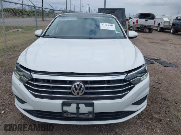 2021 Volkswagen Jetta S z VIN 3VWC57BU0MM085171, wystawiony jako IAAI lot #41688704 z przebiegiem 38 856 mil mil oraz . Historia ofert i sprzedaży dostępna na DreamBid. Obrazek 12.