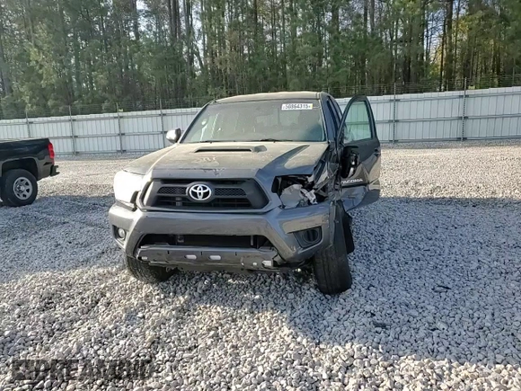 2015 Toyota Tacoma PreRunner with VIN 3TMJU4GN5FM180924, listed as a Copart auction lot 50864315 with 176,562 mi miles and Salvage title. Bid and sale history available at DreamBid. Image 11.