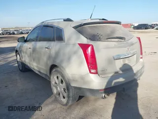 2014 Cadillac SRX Premium Collection with VIN 3GYFNDE37ES574109, listed as a IAAI auction lot 41770404 with 66,478 mi miles and . Bid and sale history available at DreamBid. Image 3.
