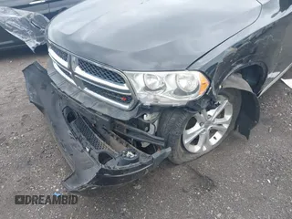 2013 Dodge Durango Crew with VIN 1C4RDJDG4DC690249, listed as a IAAI auction lot 42329188 with 225,504 mi miles and . Bid and sale history available at DreamBid. Image 6.