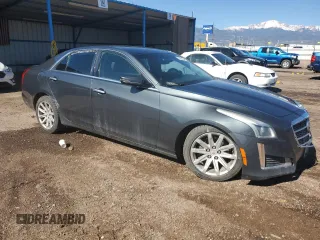 2014 Cadillac CTS AWD with VIN 1G6AW5SX2E0141060, listed as a Copart auction lot 57281445 with 137,904 mi miles and Salvage title. Bid and sale history available at DreamBid. Image 4.