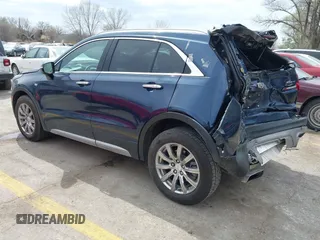 2021 Cadillac XT4 AWD Premium Luxury z VIN 1GYFZDR45MF048569, wystawiony jako IAAI lot #41902941 z przebiegiem 53 891 mil mil oraz . Historia ofert i sprzedaży dostępna na DreamBid. Obrazek 3.