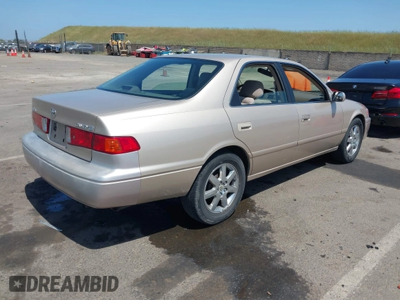 2001 Toyota Camry CE with VIN JT2BG22K910605420, listed as a IAAI auction lot 42109747 with 89,426 mi miles and . Bid and sale history available at DreamBid. Image 4.