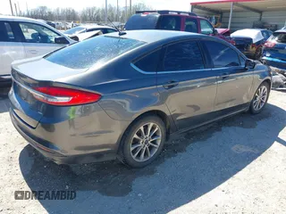 2017 Ford Fusion SE with VIN 3FA6P0H79HR198571, listed as a IAAI auction lot 41700901 with 159,386 mi miles and . Bid and sale history available at carsss.com. Image 4.