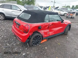 2019 MINI Convertible Cooper S с VIN WMWWG9C51K3E39565, выставлен на аукционе IAAI как лот 42125546 с пробегом 58 634 миль миль и . История ставок и продаж доступна на DreamBid. Изображение 4.